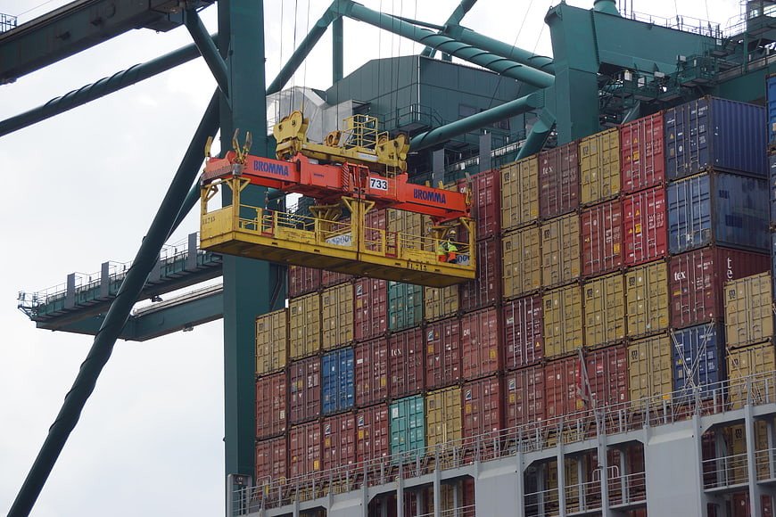 Container Ship Loading Operation With Large Yellow Crane