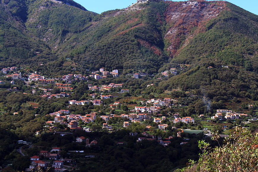 Panoramic View of Italian Mountain Village with Red Roofs