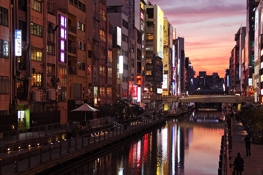 Osaka Dotonbori Canal at Sunset with Neon Lights and Reflections