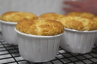 Freshly Baked Muffins Cooling on Wire Rack