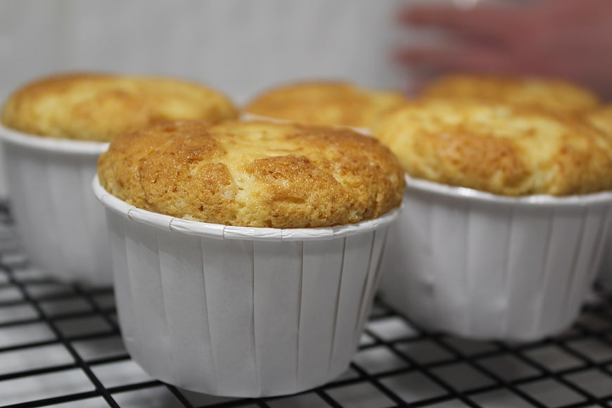 Freshly Baked Muffins Cooling on Wire Rack
