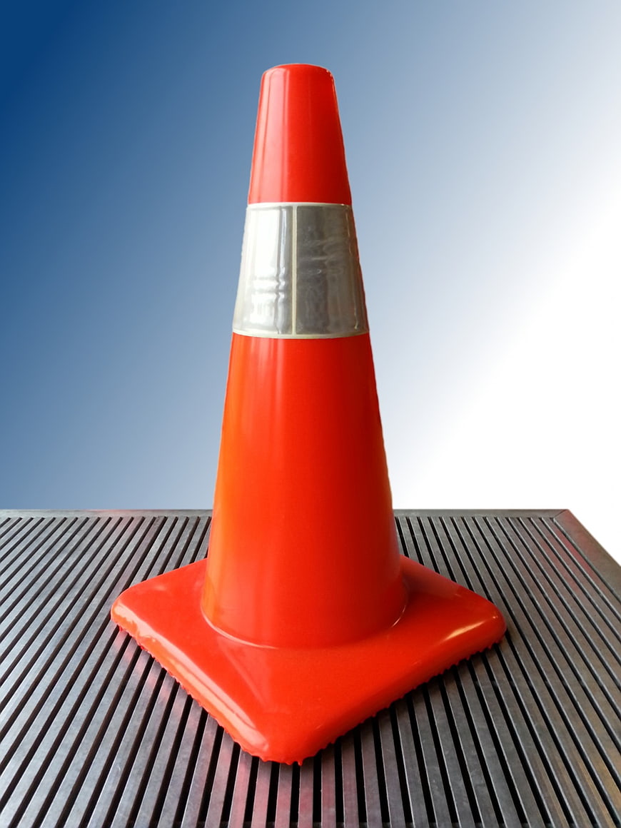 Orange Traffic Cone with Reflective Stripe on Metal Surface