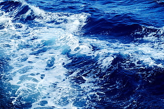 Dynamic Blue Ocean Waves with White Sea Foam