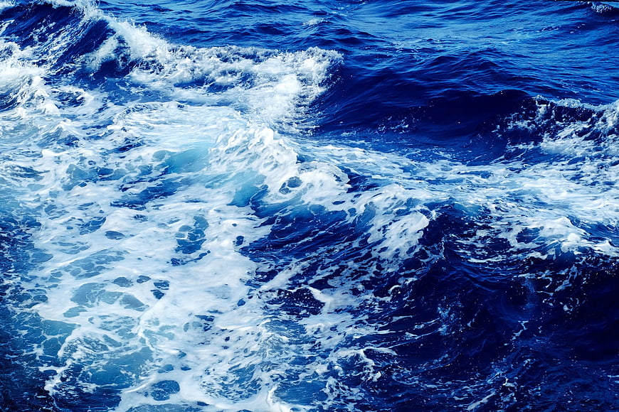 Dynamic Blue Ocean Waves with White Sea Foam