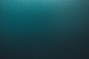 Aerial View of Deep Blue Ocean Water Surface