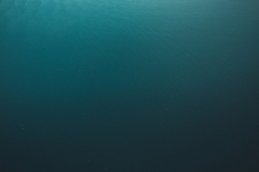 Aerial View of Deep Blue Ocean Water Surface
