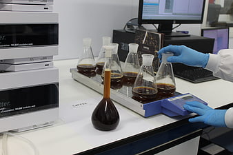 Scientist analyzing coffee samples in a laboratory