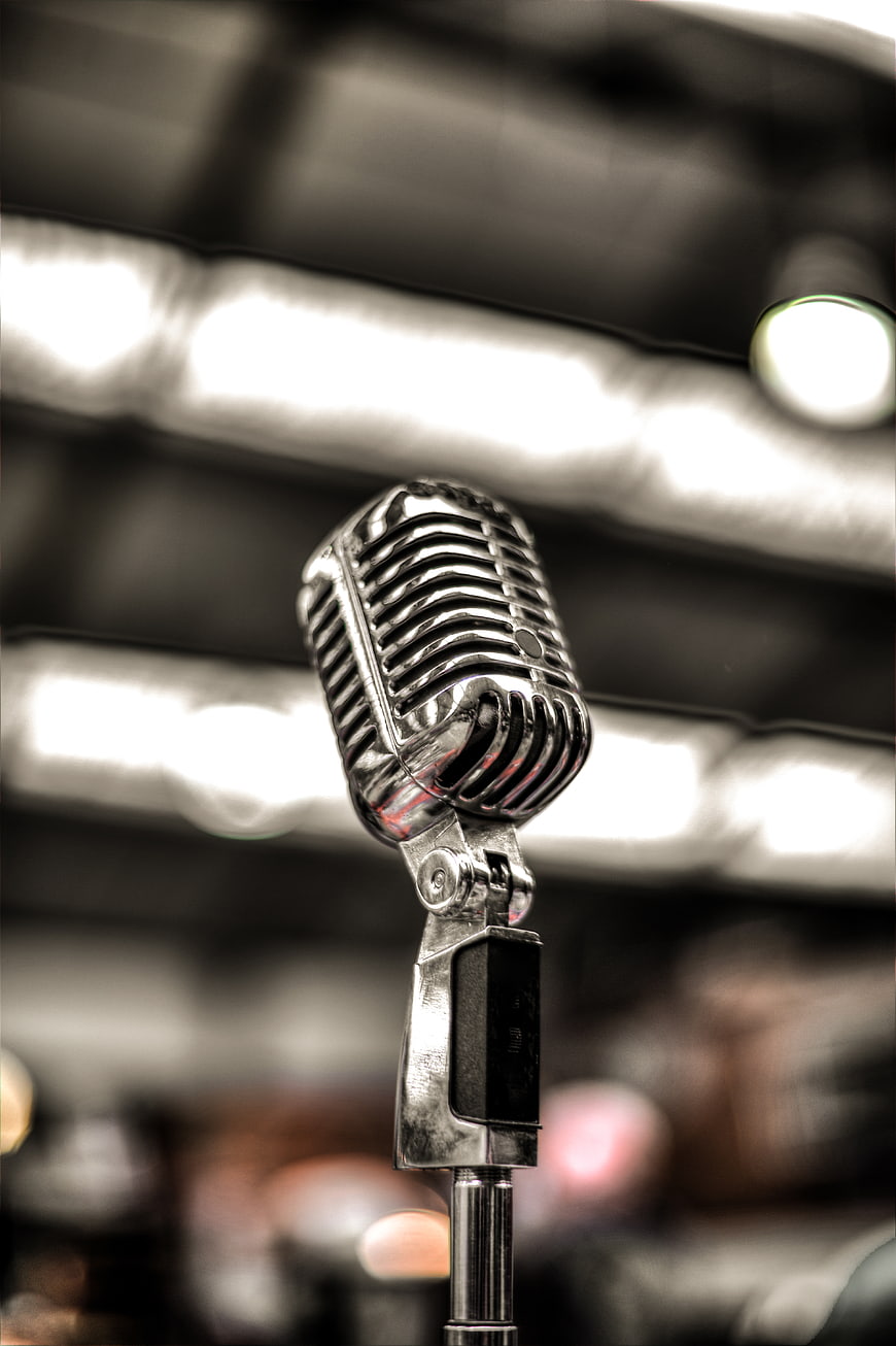 Vintage Microphone on Stage with Blurred Background