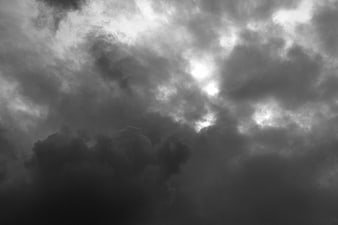 Dramatic Dark Storm Clouds With Sunlight Breaking Through