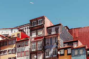 Colorful Traditional Portuguese Buildings Under Blue Sky