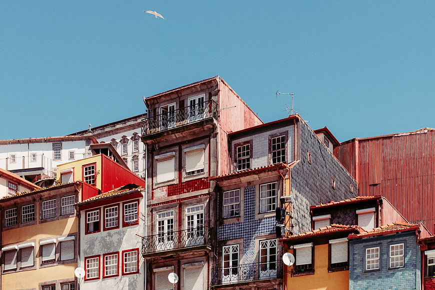 Colorful Traditional Portuguese Buildings Under Blue Sky