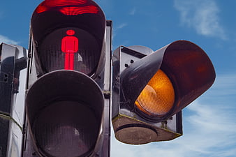Pedestrian Traffic Light Signal With Red Stop Figure And Amber Light