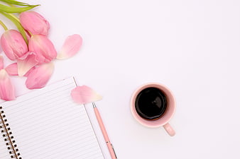 Pink Tulips, Coffee, and Notebook Flat Lay on White Background
