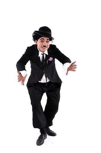 Man in Charlie Chaplin Costume with Bowler Hat and Mustache
