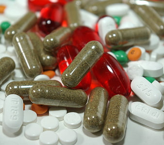 Close-up of assorted pharmaceutical capsules and tablets