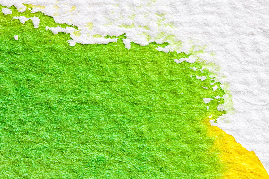 Green and Yellow Watercolor Texture on White Paper Background