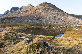 Alpine mountain landscape with small lake in Verwall, Austria