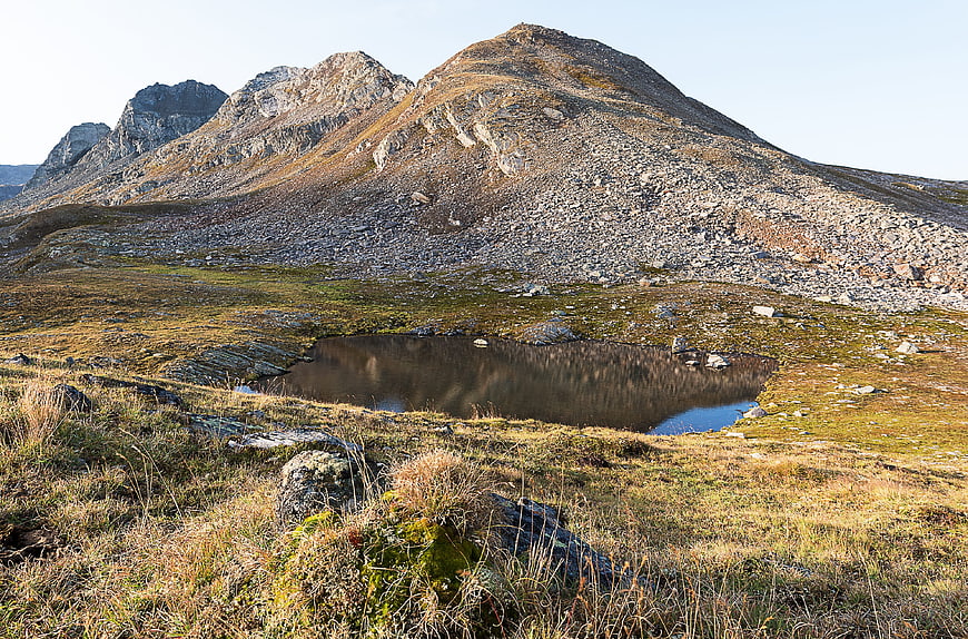 Alpine mountain landscape with small lake in Verwall, Austria