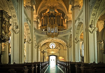 Grand Baroque Church Interior with Pipe Organ and Pews