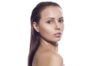 Studio Beauty Portrait Of Young Woman With Slicked Back Hair