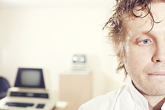 Stressed Programmer with Sweat and Retro Computer