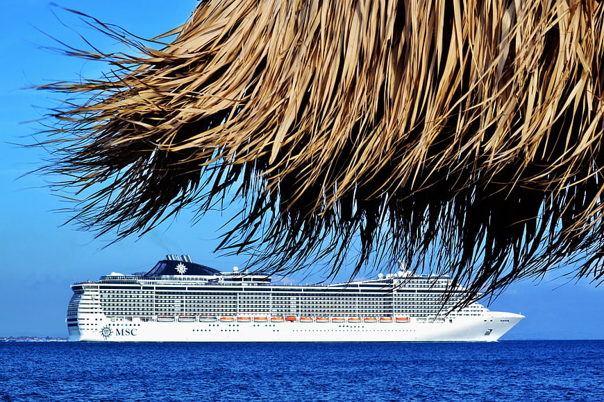 MSC Cruise Ship Viewed Through Thatched Palm Roof
