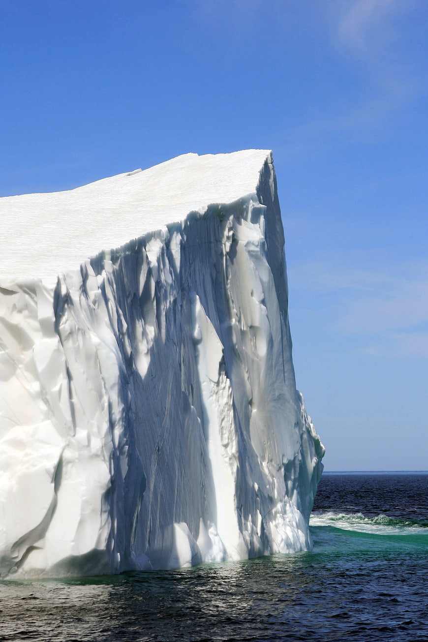 Massive Tabular Iceberg Floating in Arctic Ocean