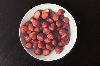 Top View of Chopped Strawberries in White Bowl