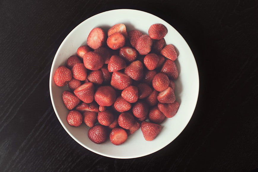 Top View of Chopped Strawberries in White Bowl