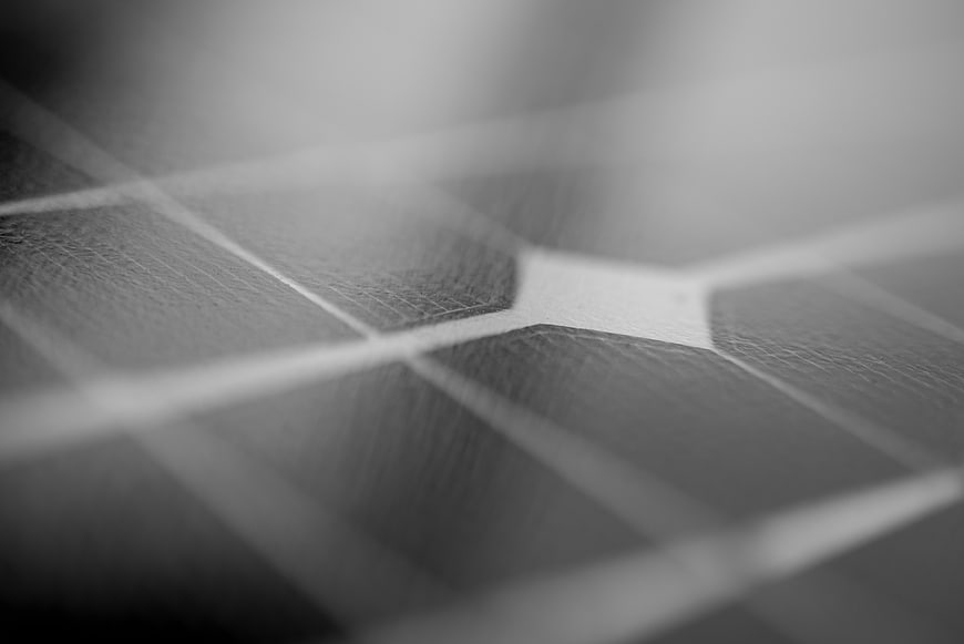 Close-up of solar panel texture in black and white
