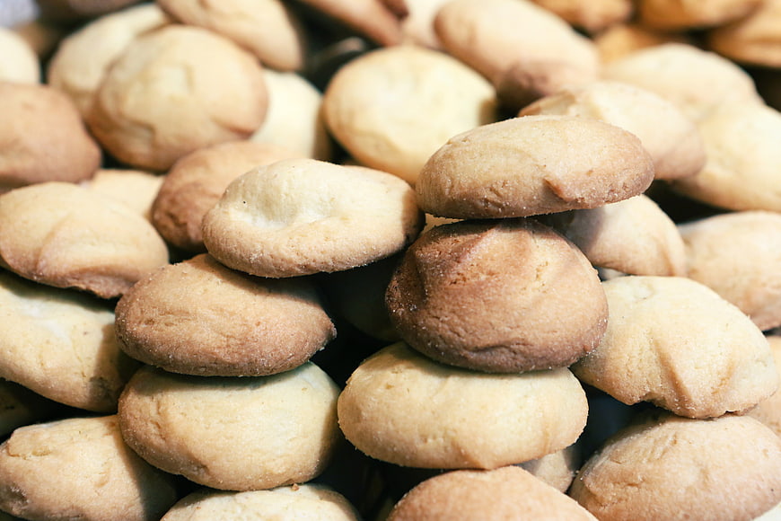 Close-up of golden baked cookies piled high