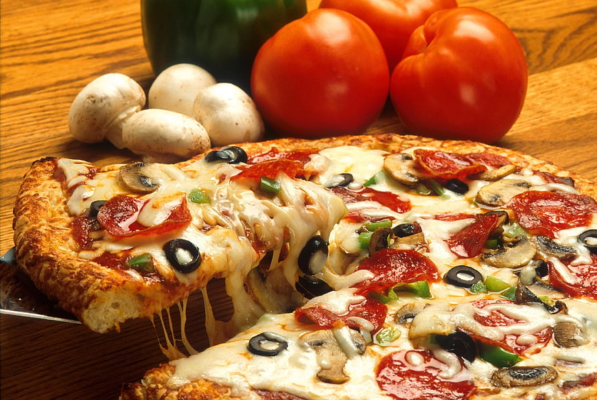 Delicious Pepperoni Pizza Slice with Cheese Pull