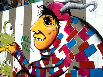 Colorful Graffiti Mural of Cartoon Character with Horns
