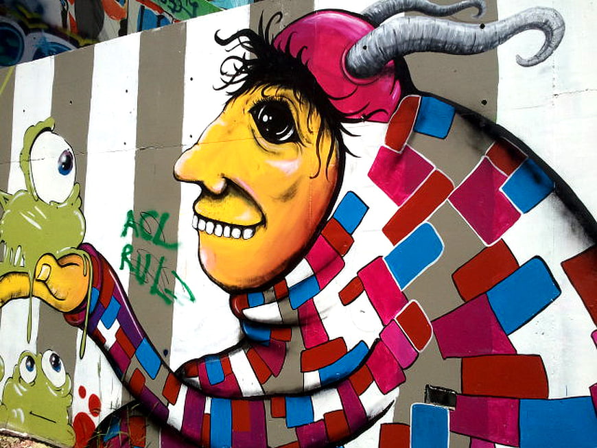 Colorful Graffiti Mural of Cartoon Character with Horns