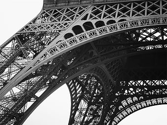 Black and white low angle view of Eiffel Tower ironwork