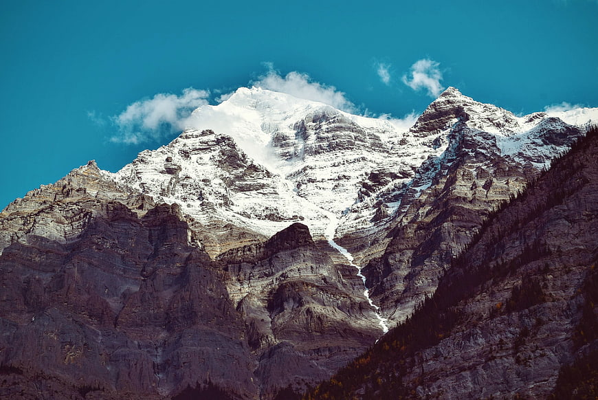 Majestic Snow-Capped Mountain Peak with Blue Sky
