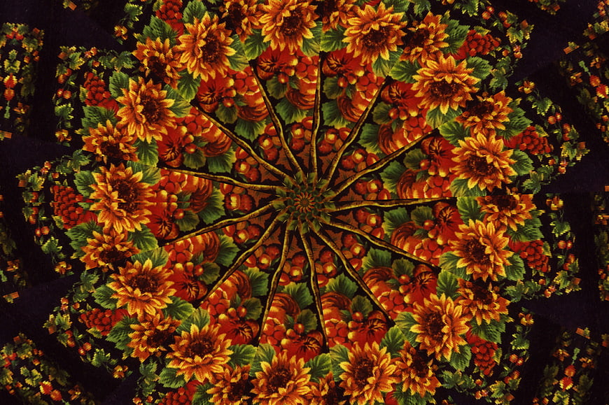 Kaleidoscope Pattern of Sunflowers and Red Flowers