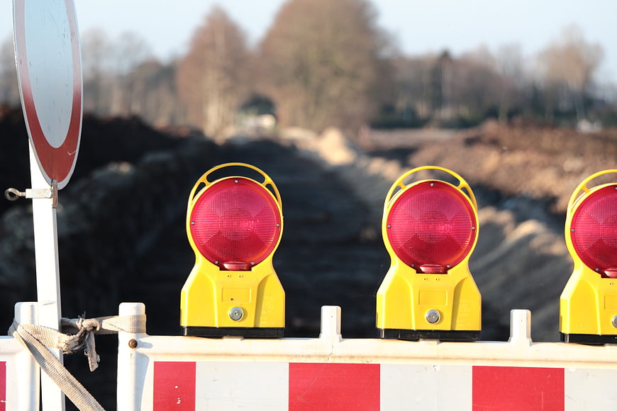 Yellow Warning Lights on Construction Barrier