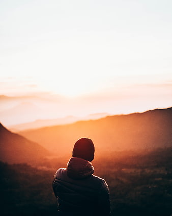 Silhouette of Man Watching Mountain Sunrise