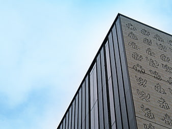 Modern Building Facade with Decorative Brick Pattern