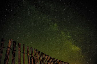 Milky Way Galaxy Over Wooden Fence at Night