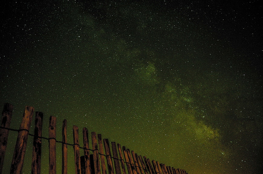 Milky Way Galaxy Over Wooden Fence at Night