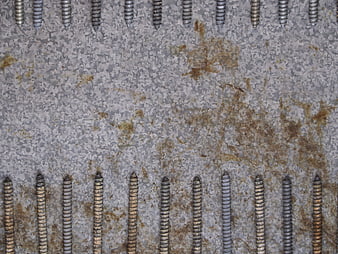 Rusted metal plate with screws texture background