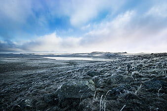 Frosty Aubrac Landscape with Buron and Frozen Pond