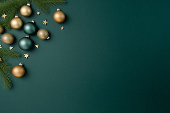 Elegant Christmas Flat Lay with Gold and Green Ornaments