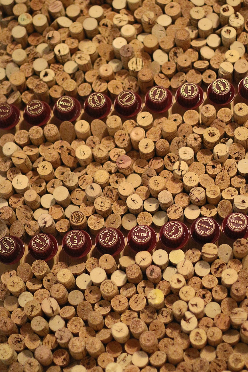 Top view of wine corks and red diffuser caps pattern