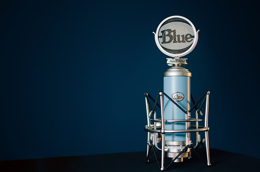 Blue Microphone on Dark Blue Background