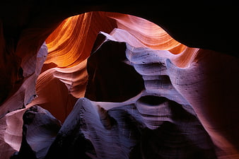 Antelope Canyon sandstone rock formations with dramatic light