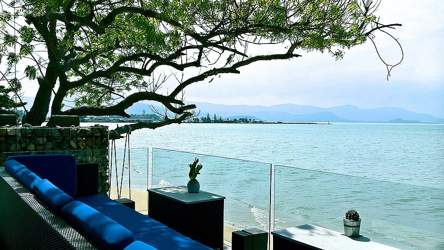 Luxury Blue Sofa on Balcony Overlooking Ocean View
