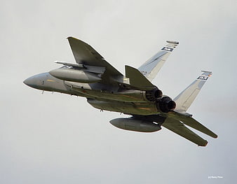 F-15C Eagle Fighter Jet in Flight Against Sky